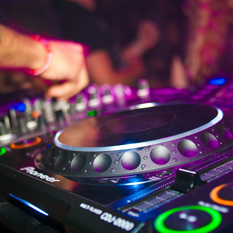 Photo of a DJ and Decks | You Have What it Takes to be an Independent DJ or Producer